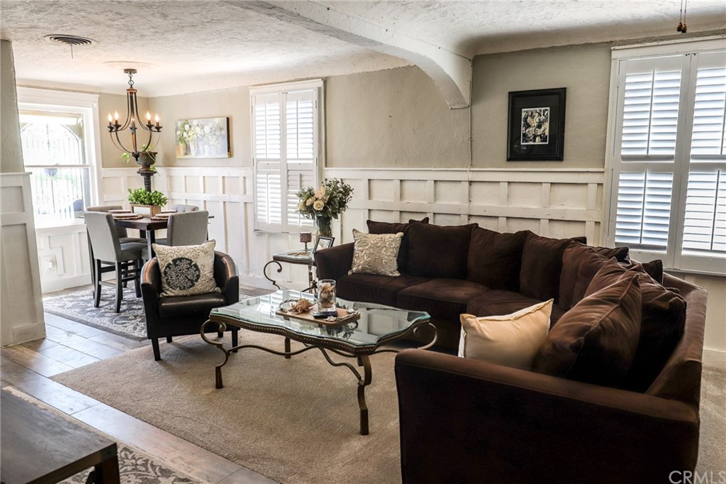 304 C Street Needles, CA 92363 - Photo 23 of 57 a living room with furniture and a wooden floor