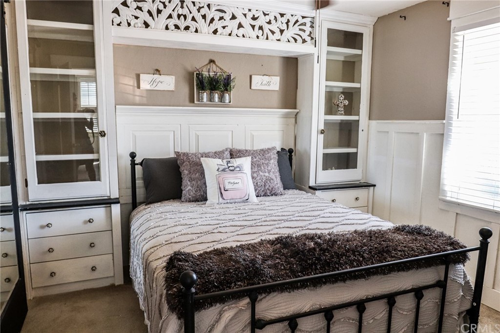 304 C Street Needles, CA 92363 - Photo 40 of 57 a bedroom with a bed and a window