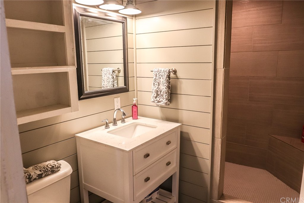 304 C Street Needles, CA 92363 - Photo 44 of 57 a bathroom with a sink and a mirror