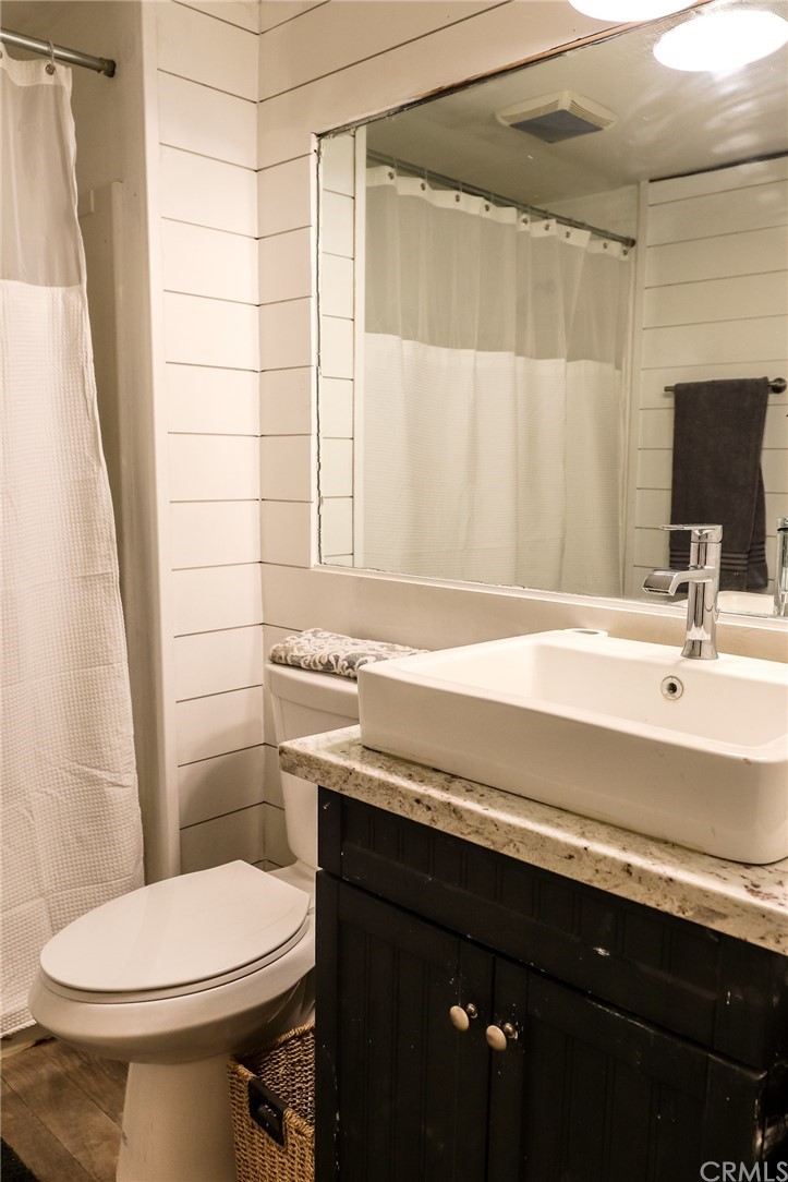 304 C Street Needles, CA 92363 - Photo 51 of 57 a bathroom with a sink a toilet and shower