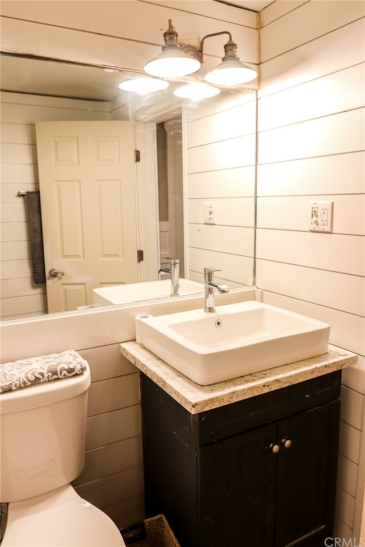 304 C Street Needles, CA 92363 - Photo 53 of 57 a bathroom with a sink and a toilet