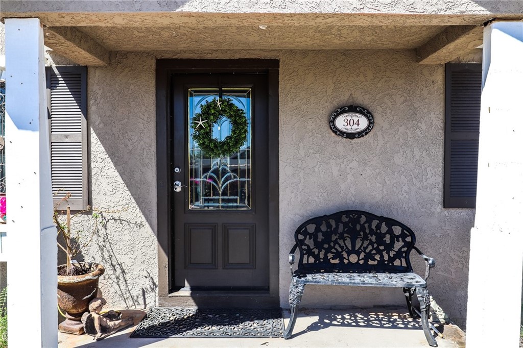 304 C Street Needles, CA 92363 - Photo 8 of 57 a view of a entryway door of the house