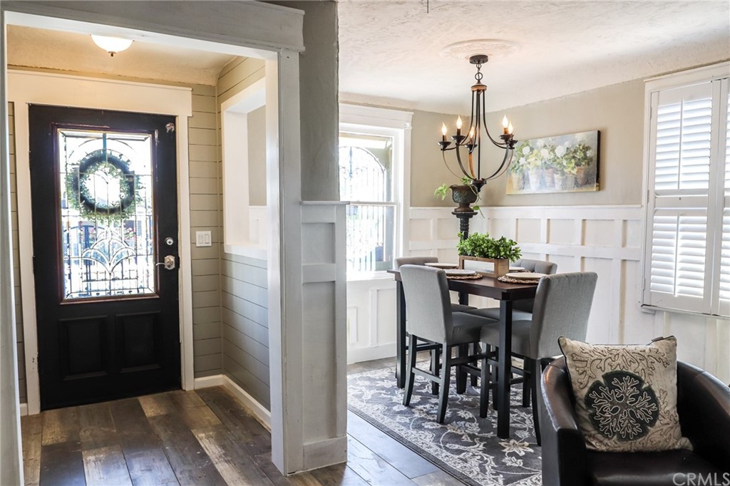 304 C Street Needles, CA 92363 - Photo 10 of 57 a view of a dining room with furniture window and wooden floor