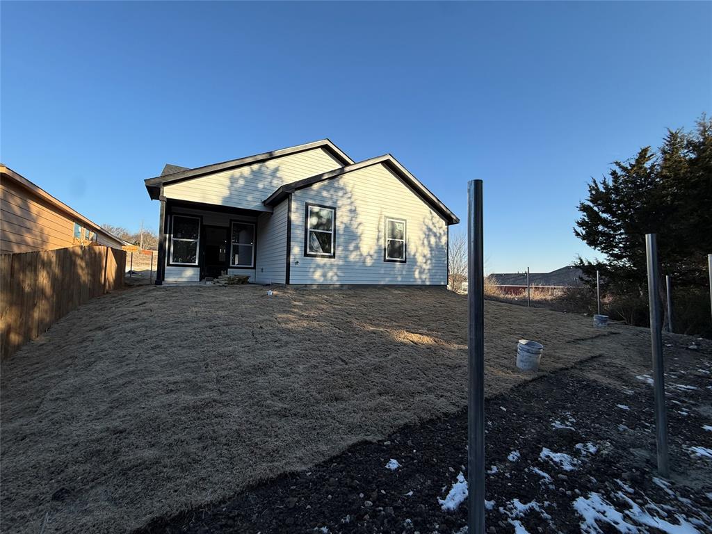 5803 Plum Dale Road Dallas, TX 75241 - Photo 14 of 14 a view of a house with backyard