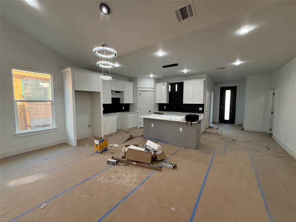 5803 Plum Dale Road Dallas, TX 75241 - Photo 3 of 14 a living room with furniture and kitchen