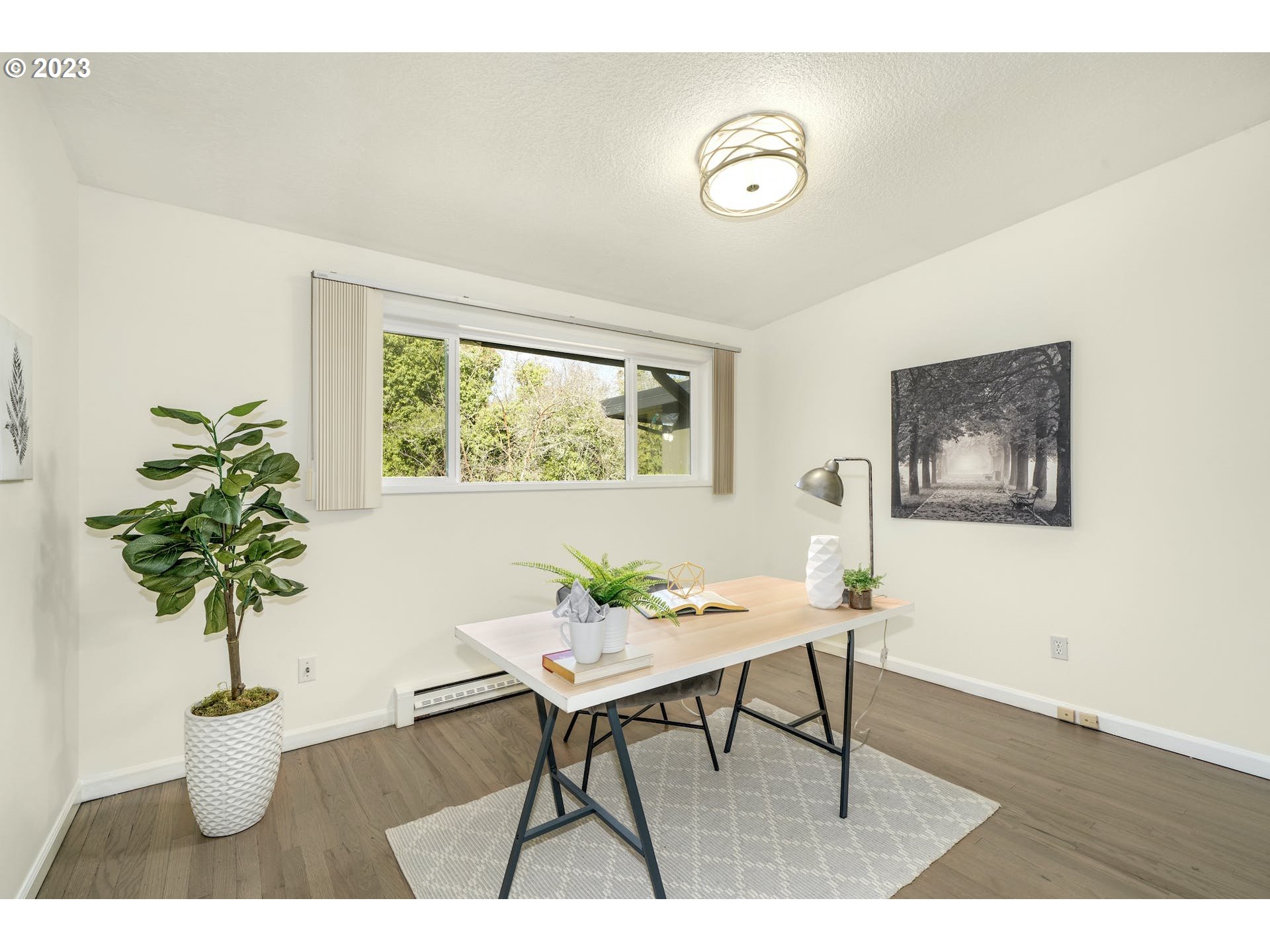 5225 Southwest Oleson Road, Unit 10 Portland, OR 97225 - Photo 17 of 30 a living room with furniture and a potted plant
