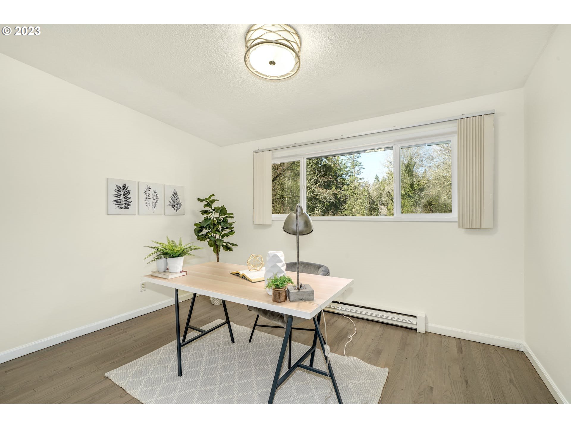 5225 Southwest Oleson Road, Unit 10 Portland, OR 97225 - Photo 18 of 30 a workspace with furniture and a window