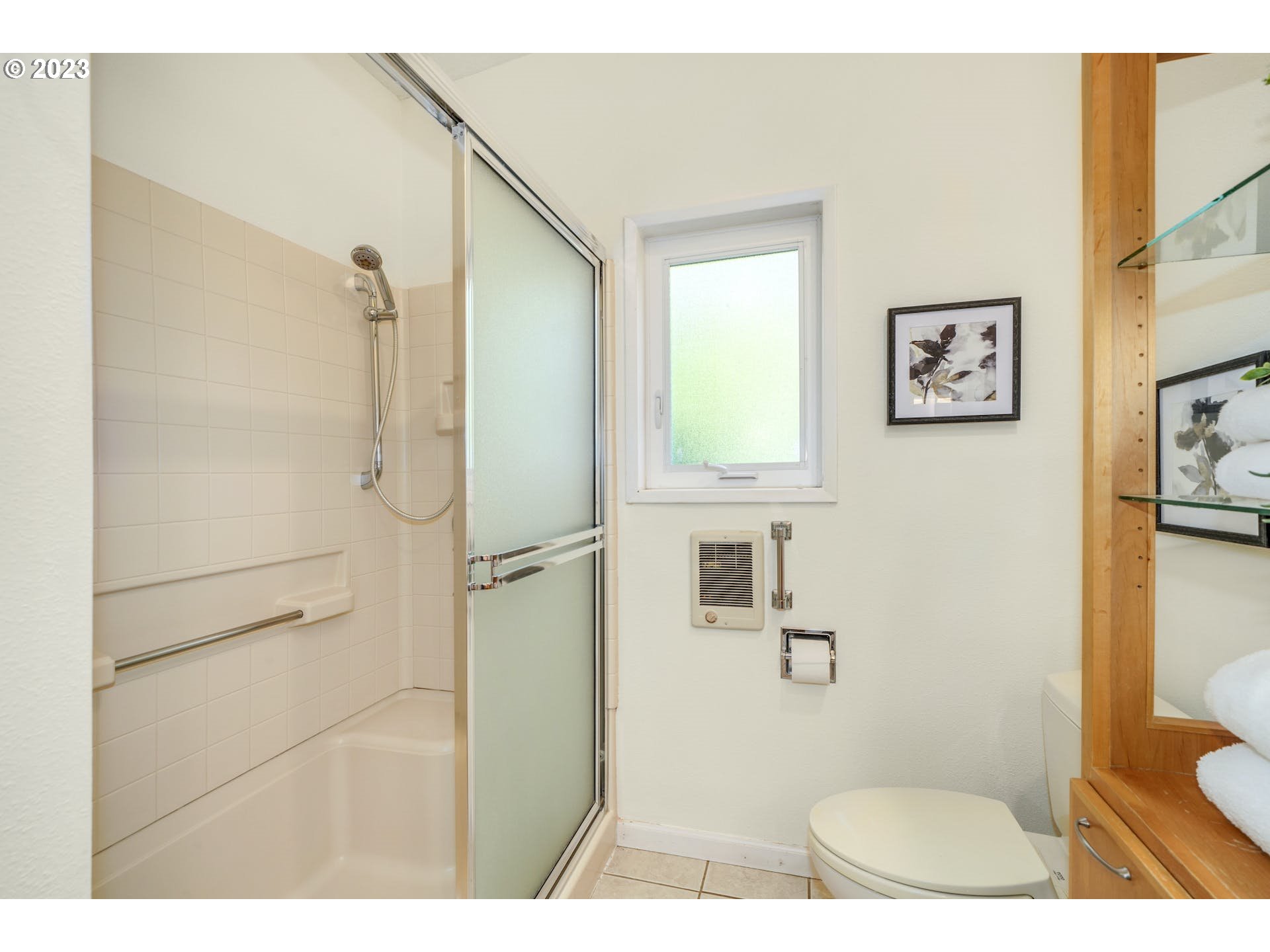 5225 Southwest Oleson Road, Unit 10 Portland, OR 97225 - Photo 20 of 30 a bathroom with a toilet and a shower