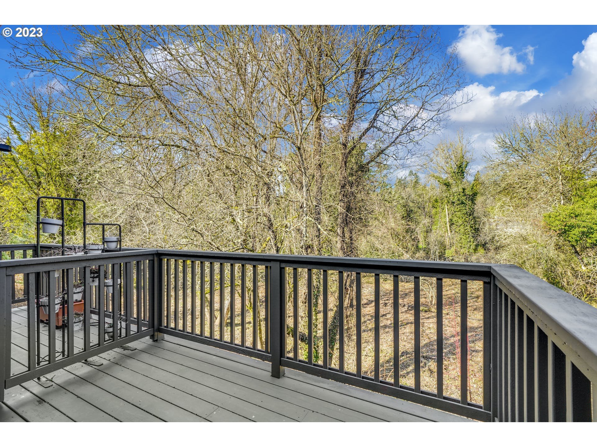 5225 Southwest Oleson Road, Unit 10 Portland, OR 97225 - Photo 21 of 30 a view of balcony with wooden floor