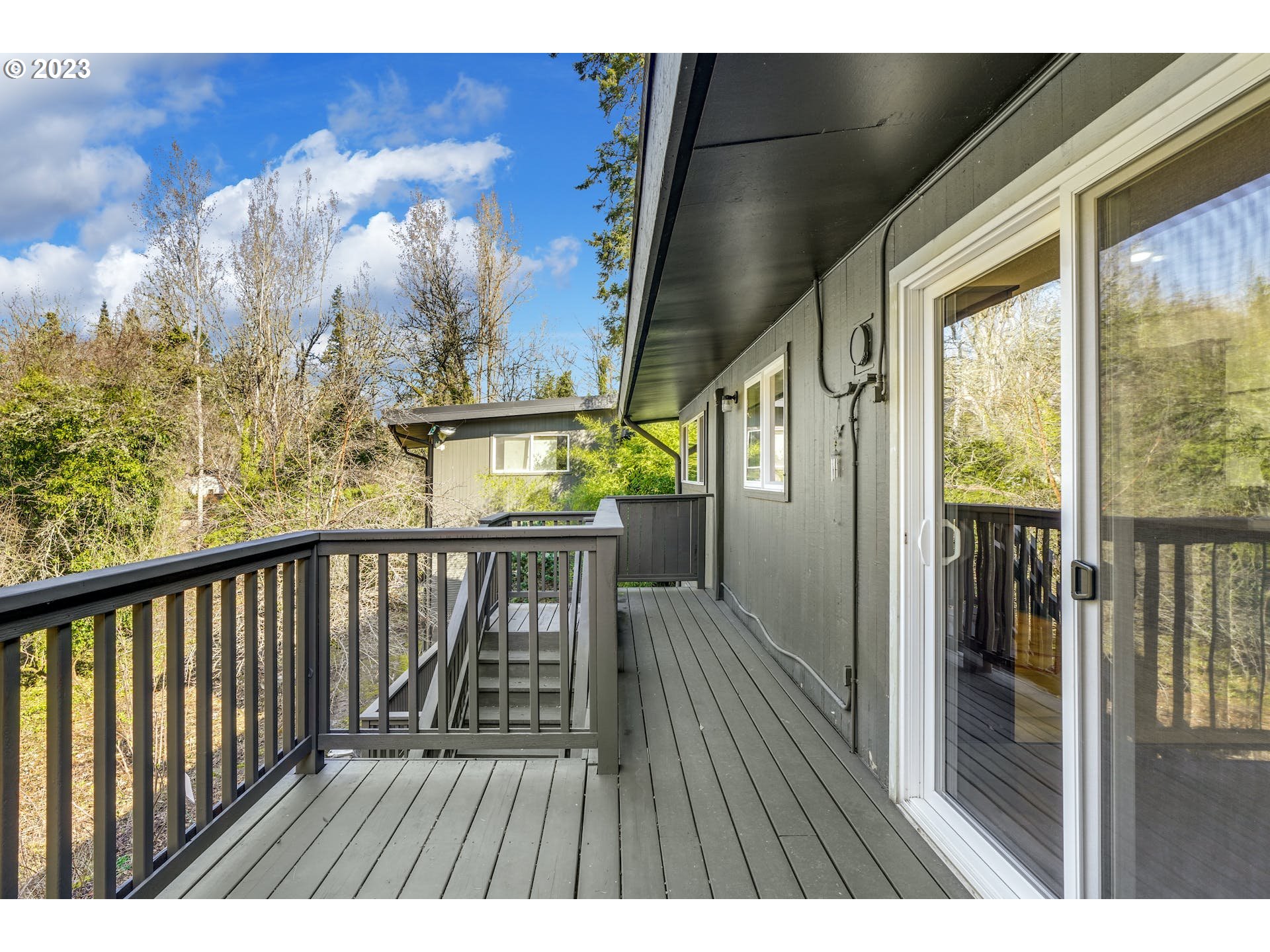 5225 Southwest Oleson Road, Unit 10 Portland, OR 97225 - Photo 24 of 30 a view of balcony with wooden floor