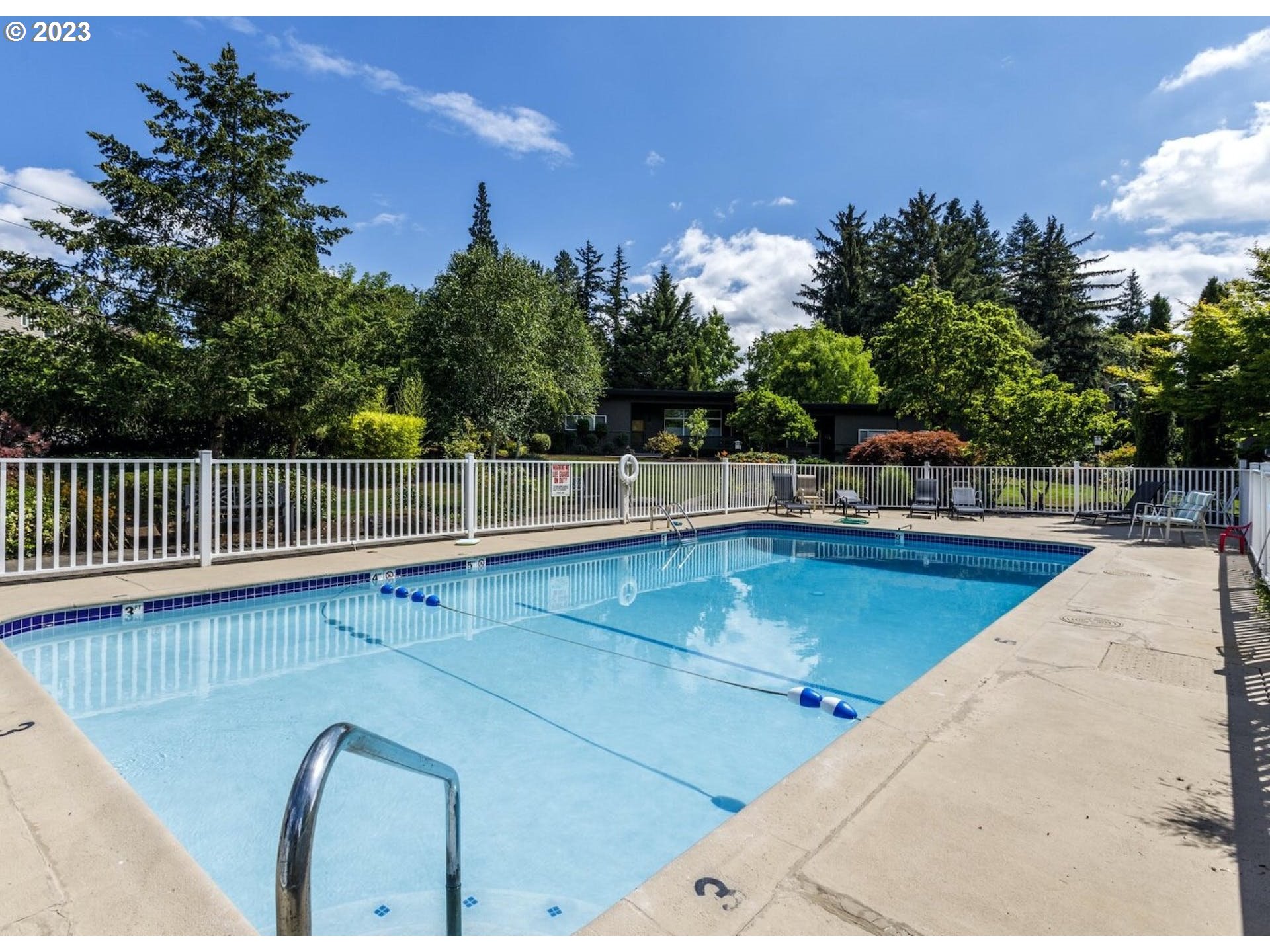 5225 Southwest Oleson Road, Unit 10 Portland, OR 97225 - Photo 26 of 30 a view of a swimming pool with a patio
