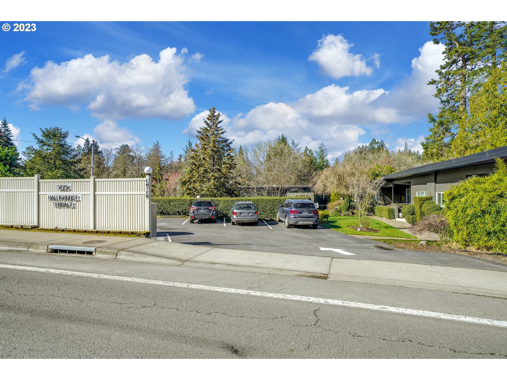 5225 Southwest Oleson Road, Unit 10 Portland, OR 97225 - Photo 29 of 30 a view of a street with a building