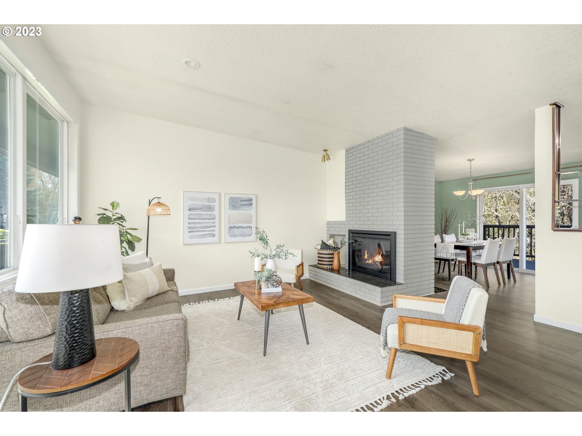 5225 Southwest Oleson Road, Unit 10 Portland, OR 97225 - Photo 4 of 30 a living room with furniture and a fireplace