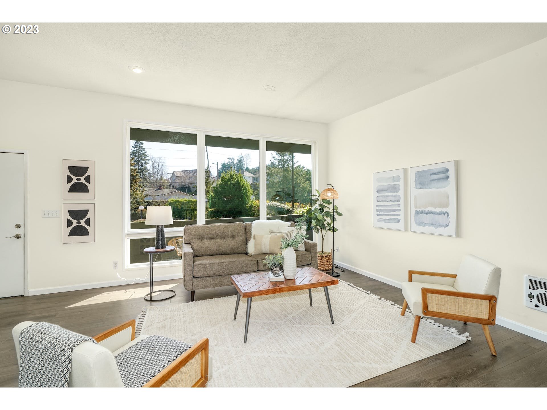 5225 Southwest Oleson Road, Unit 10 Portland, OR 97225 - Photo 6 of 30 a living room with furniture and a large window