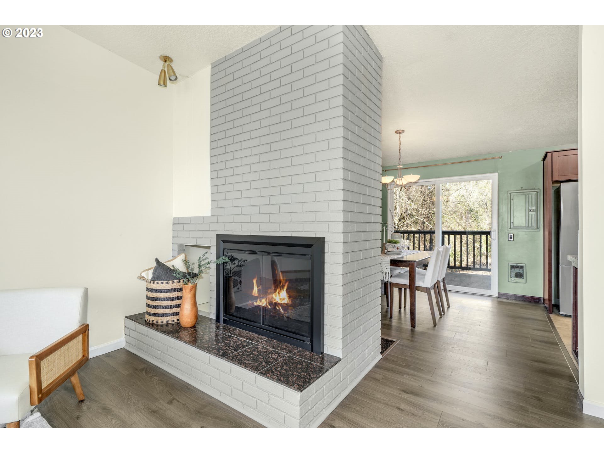 5225 Southwest Oleson Road, Unit 10 Portland, OR 97225 - Photo 8 of 30 a living room with furniture and a fireplace