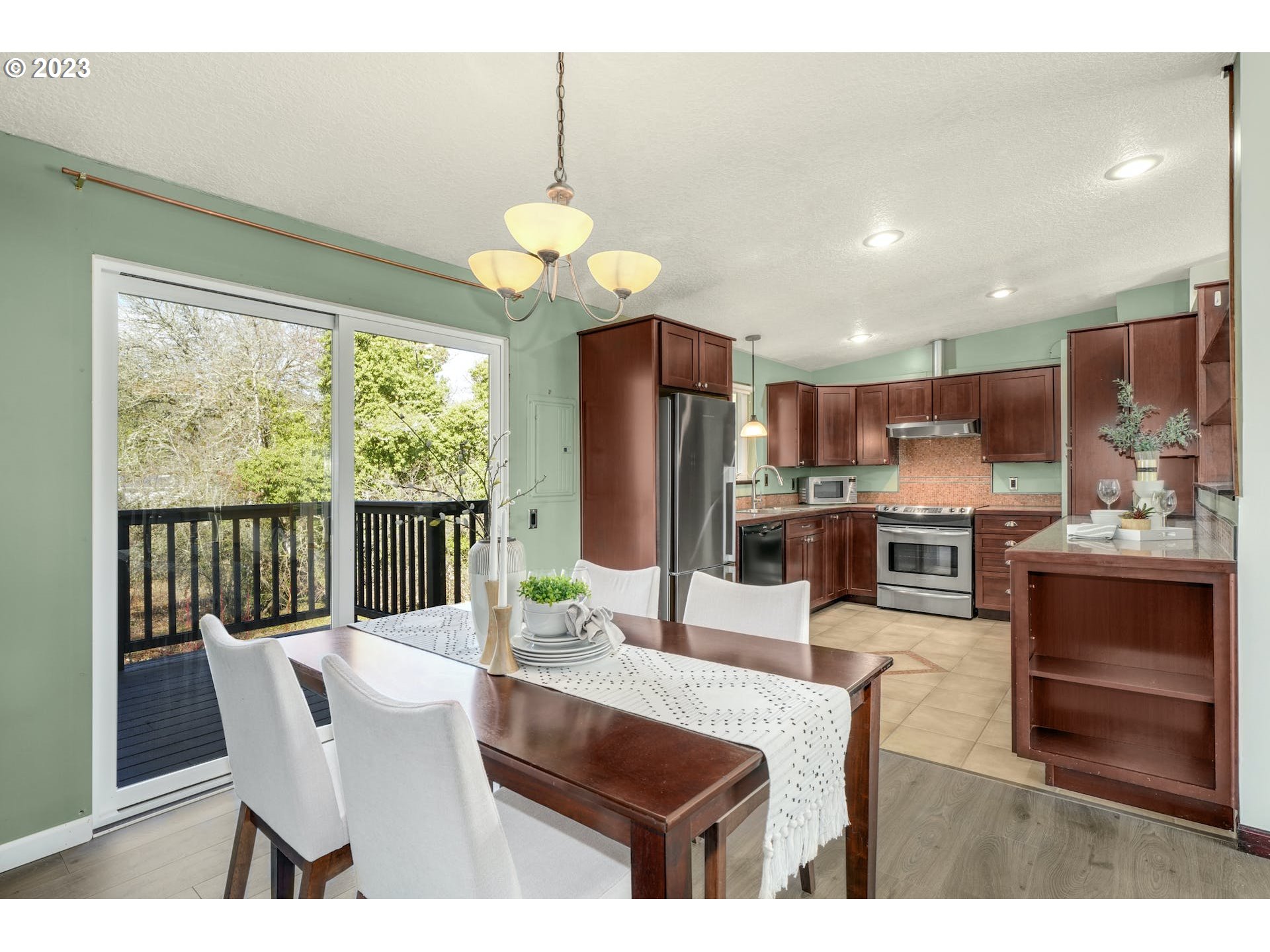 5225 Southwest Oleson Road, Unit 10 Portland, OR 97225 - Photo 10 of 30 a view of a dining room and livingroom view