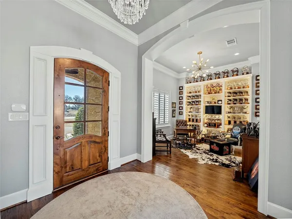 a view of a livingroom with furniture and window