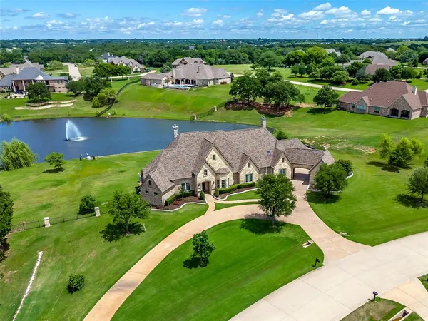 an aerial view of a house with a garden
