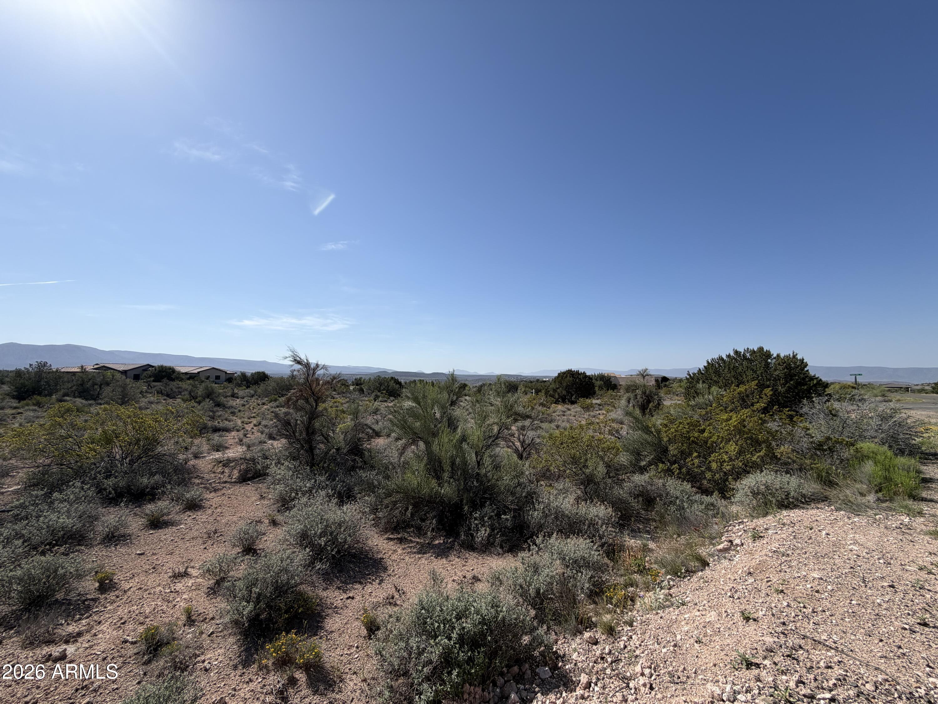 4850 Crazy Horse Circle, Unit 76 Rimrock, AZ 86335 - Photo 4 of 8 a view of a covered with trees in the background