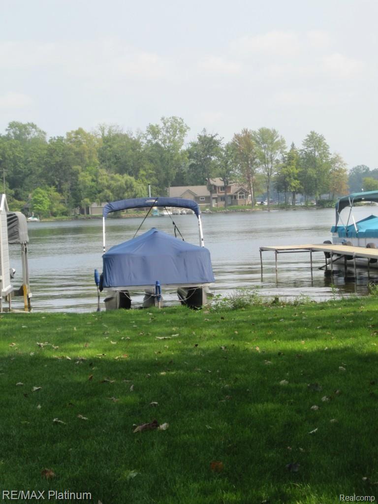 10255 Kress Road Pinckney, MI 48169 - Photo 5 of 30 Sellers' boat moored on Strawberry Lake