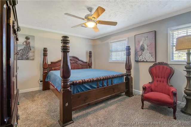 a view of livingroom with furniture and a flat screen tv