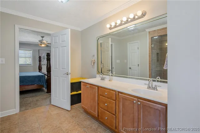 a bathroom with a shower and a sink
