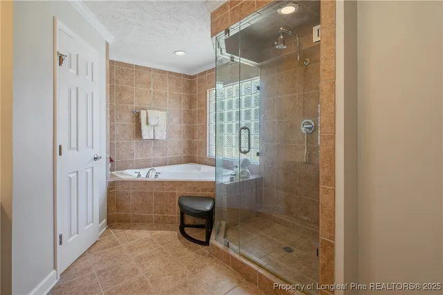 a bathroom with a shower and a toilet