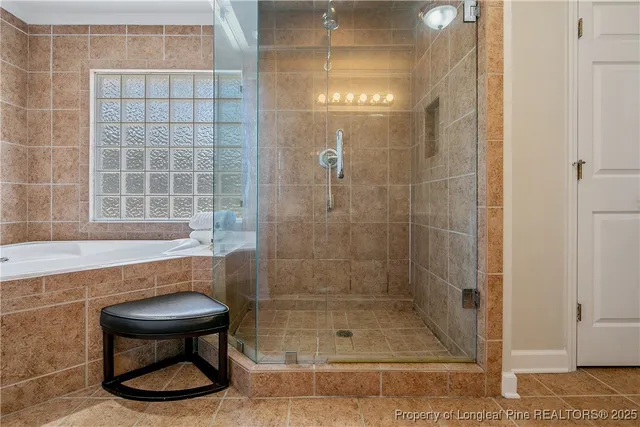 a bed room with a bed and a mirror