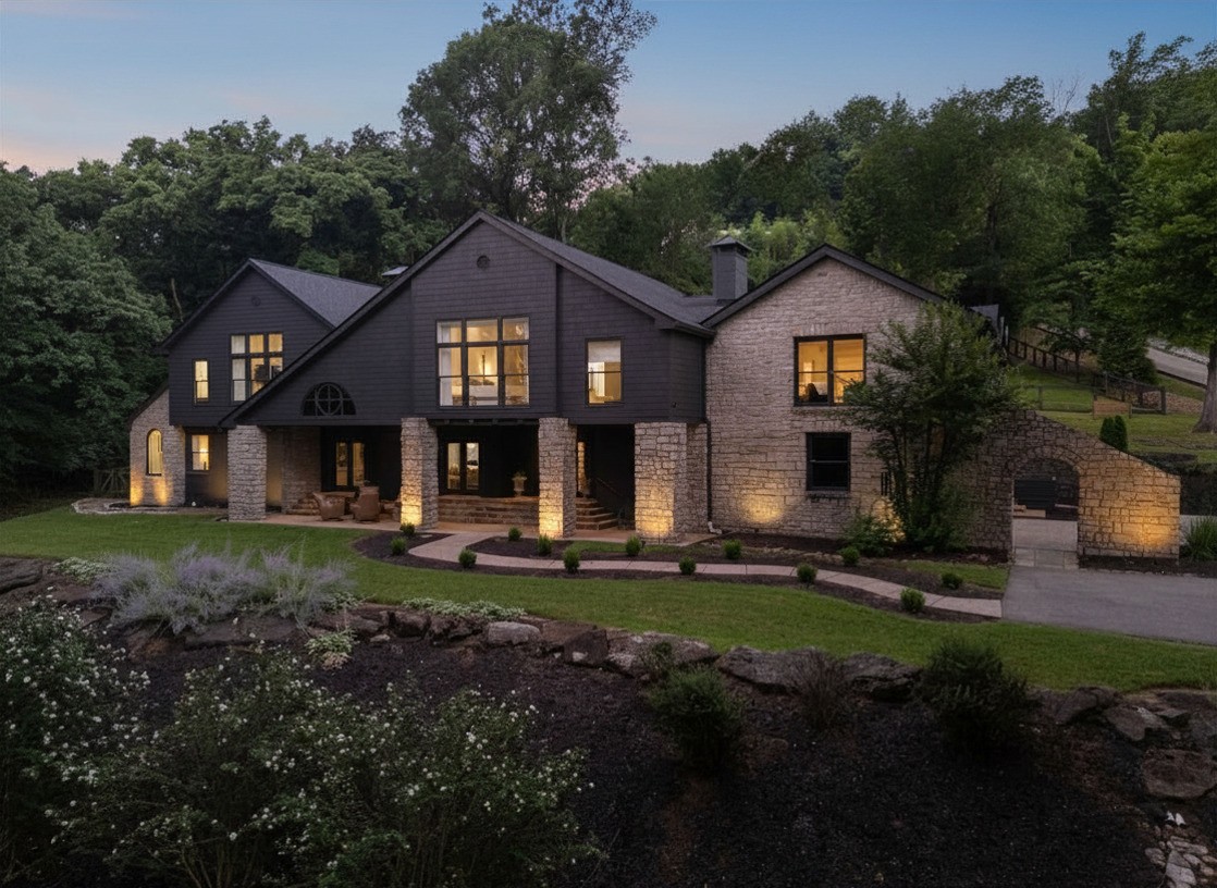 915 Overton Lea Road Nashville, TN 37220 - Photo 1 of 75 a front view of a house with a yard