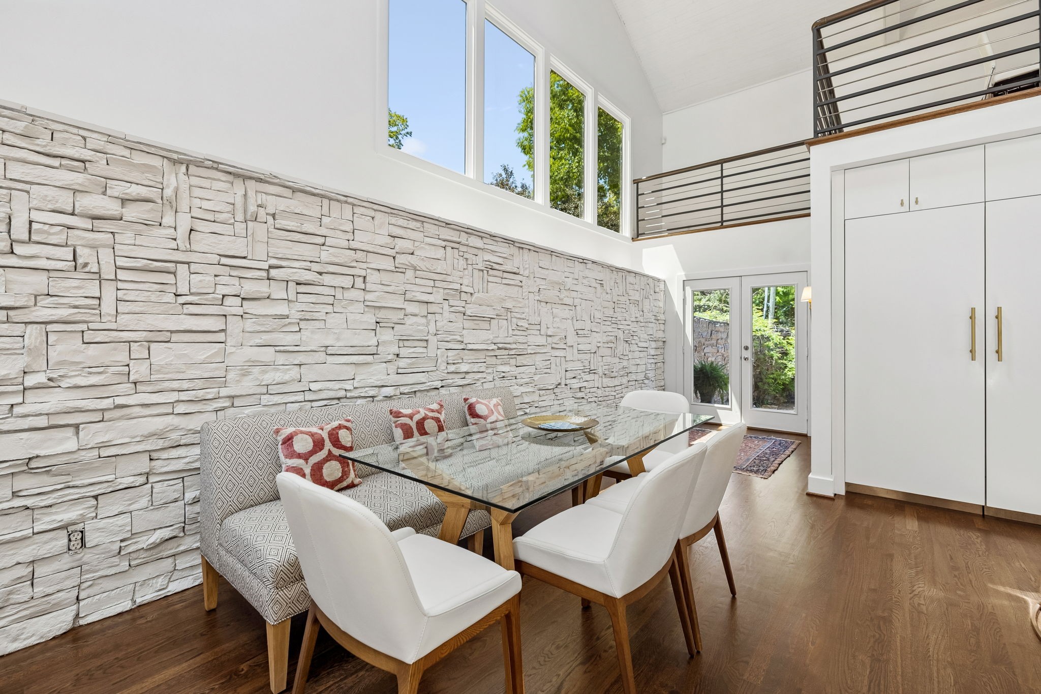 915 Overton Lea Road Nashville, TN 37220 - Photo 26 of 75 a view of a dining room with furniture and wooden floor