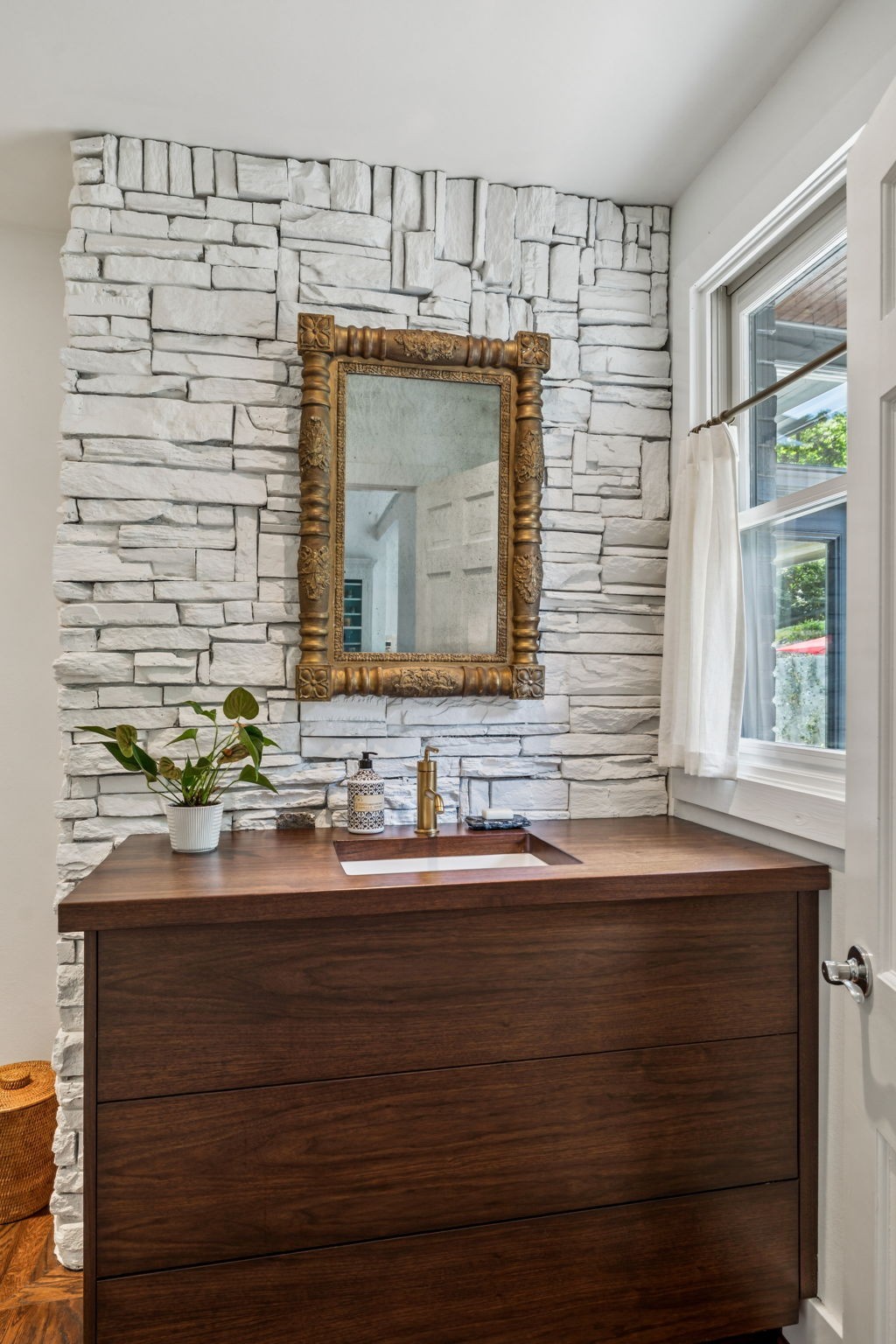 915 Overton Lea Road Nashville, TN 37220 - Photo 30 of 75 a bathroom with a sink and a mirror