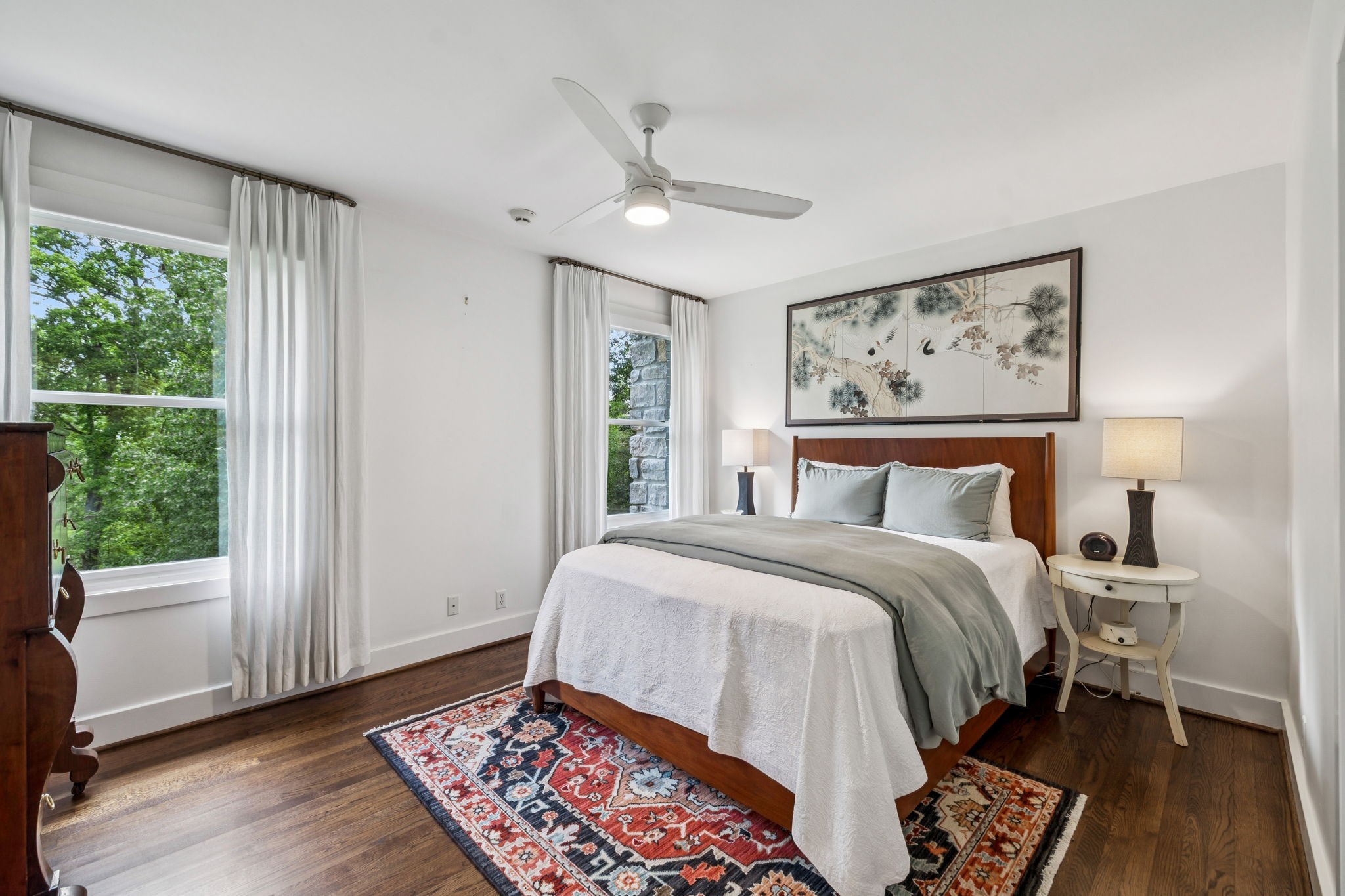 915 Overton Lea Road Nashville, TN 37220 - Photo 31 of 75 a bedroom with a large bed and a window