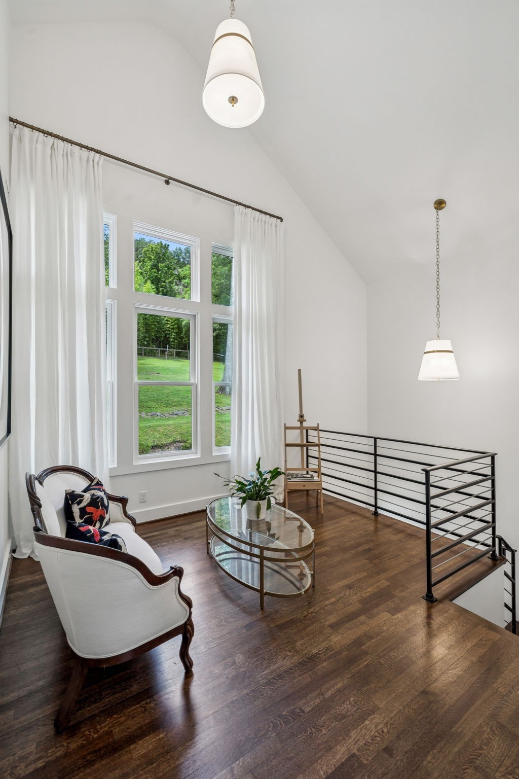 915 Overton Lea Road Nashville, TN 37220 - Photo 40 of 75 a living room with furniture and a large window