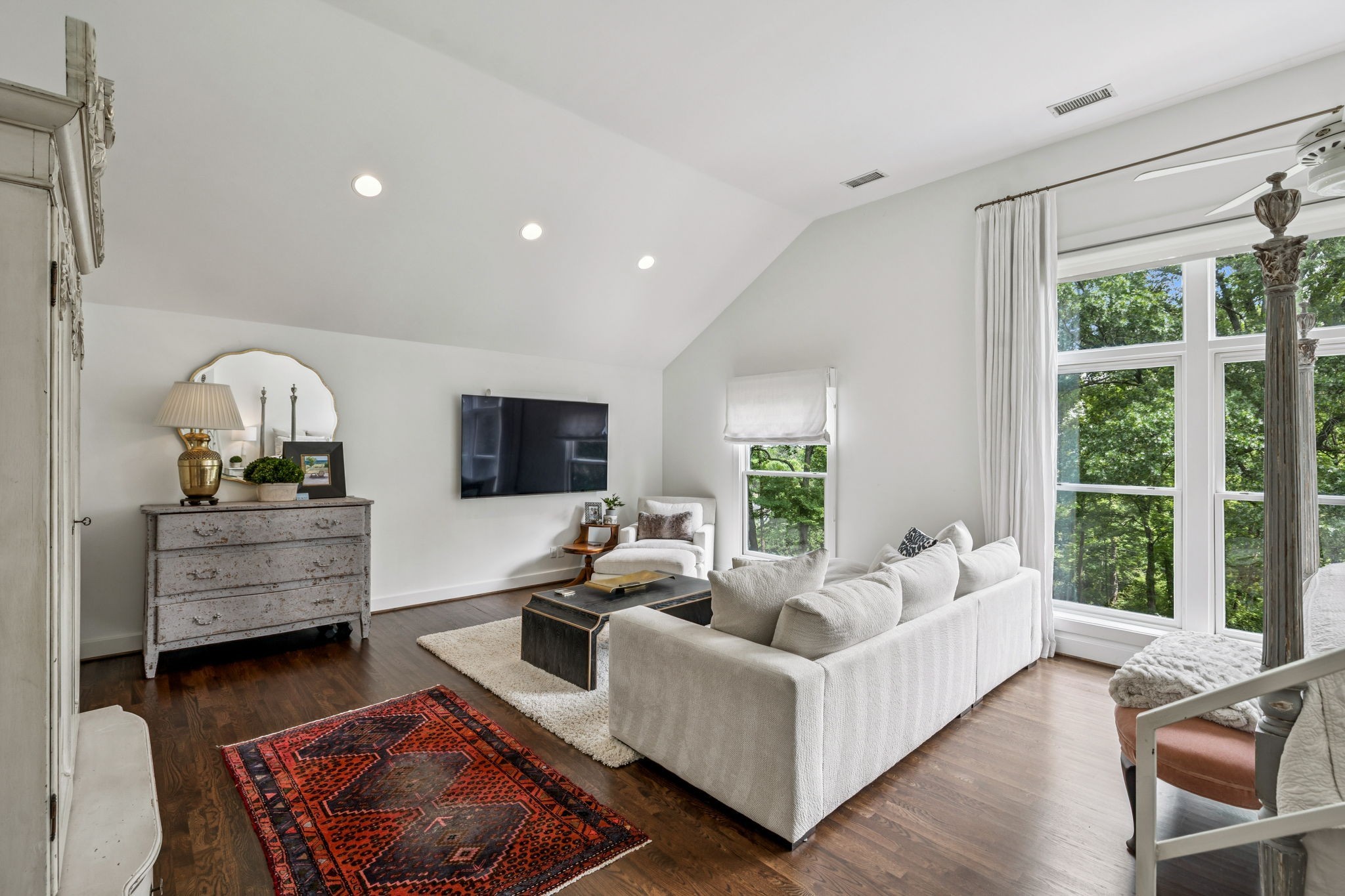 915 Overton Lea Road Nashville, TN 37220 - Photo 50 of 75 a living room with furniture and a flat screen tv