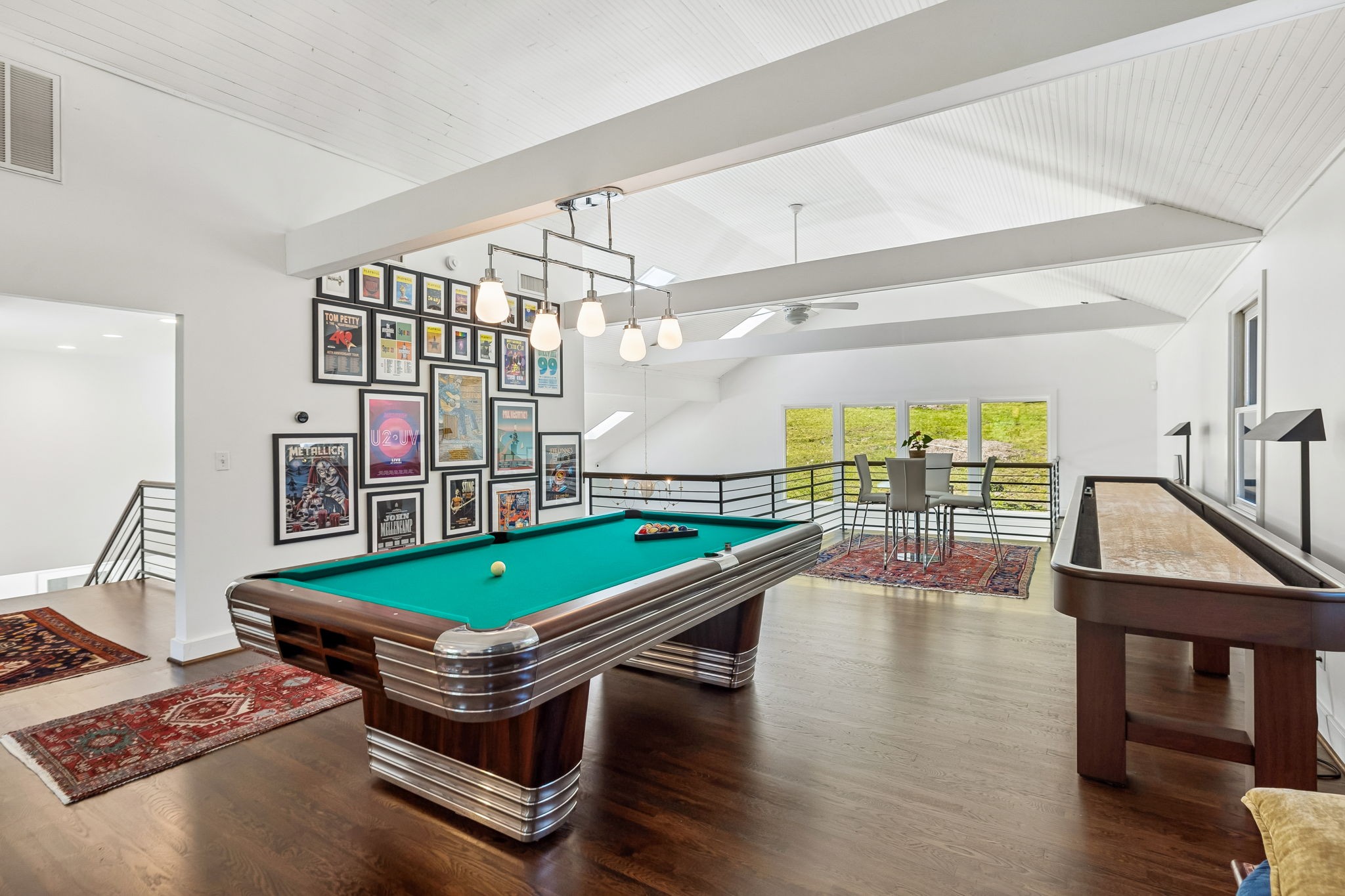 915 Overton Lea Road Nashville, TN 37220 - Photo 59 of 75 a room with furniture pool table wooden floor and windows