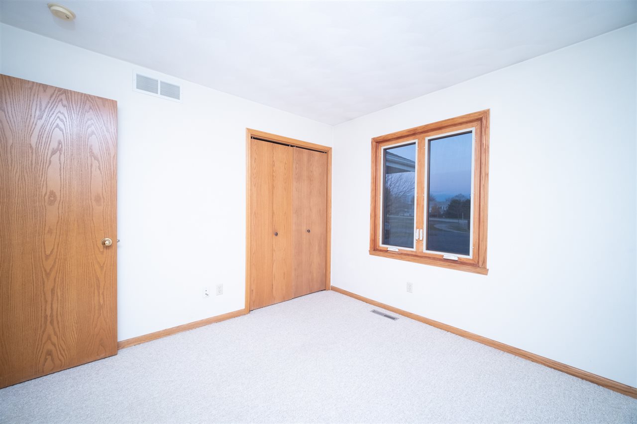 6614 North Point Road Rockford, IL 61108 - Photo 16 of 26 a view of an empty room with a window