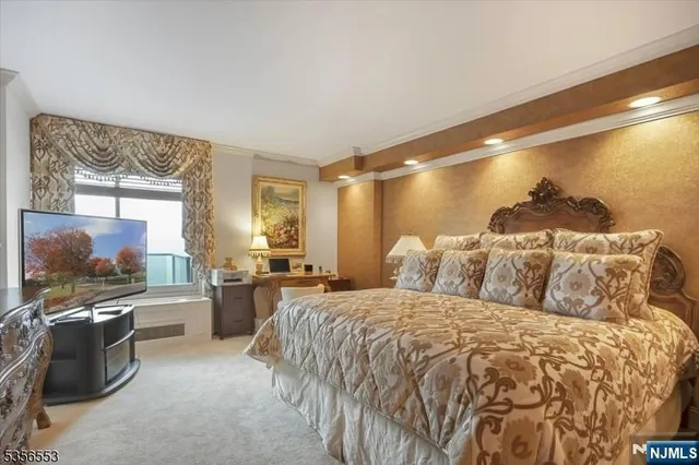 a bed room with a bed and furniture