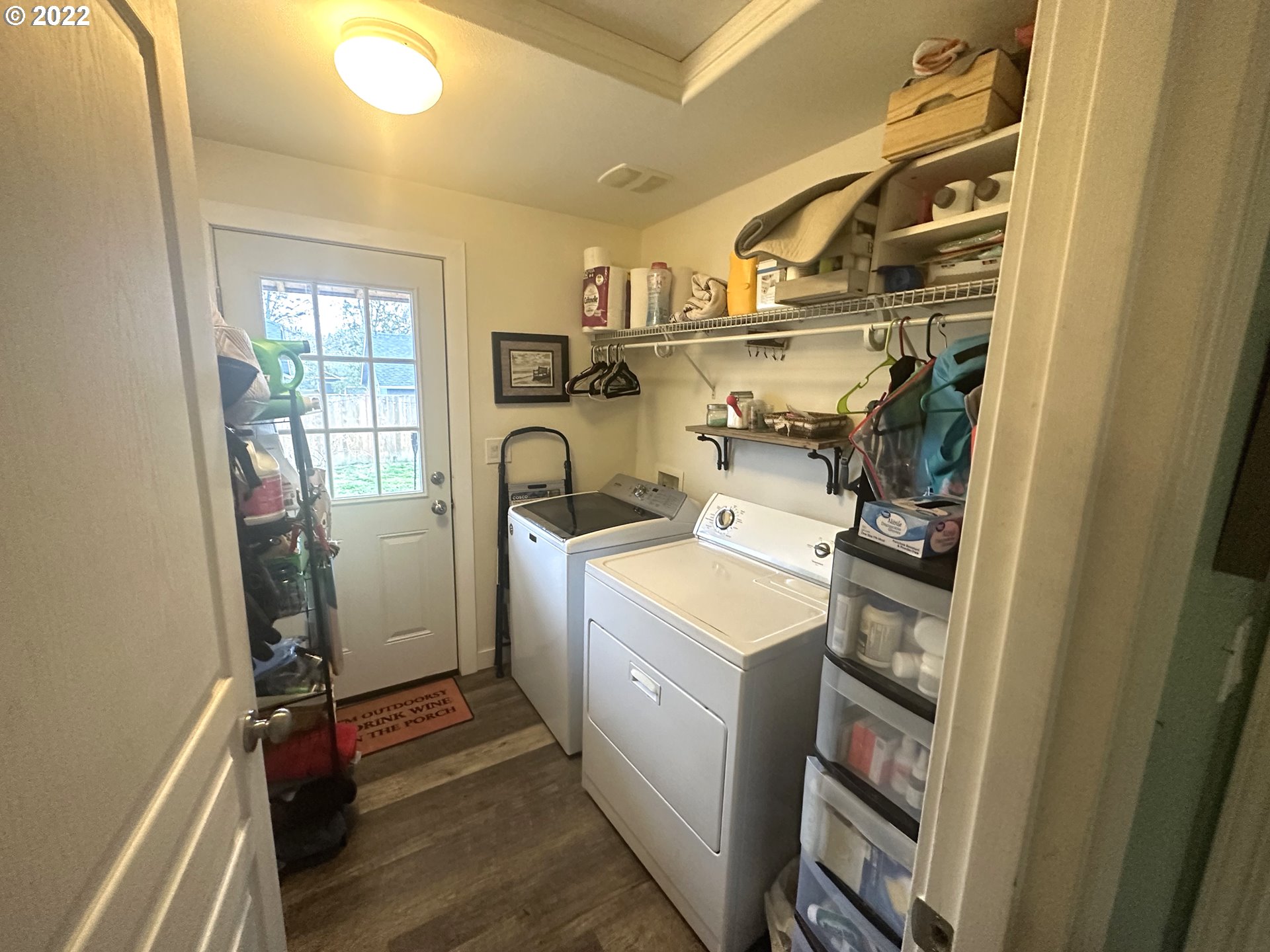 5795 Mineral Way Springfield, OR 97478 - Photo 13 of 25 a view of storage and utility room with washer and dryer