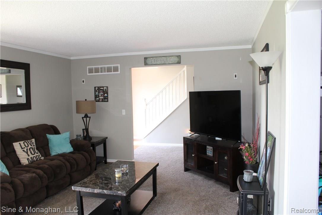 26523 Prinz Road Richmond, MI 48062 - Photo 20 of 61 OPPOSITE END OF LIVING ROOM VIEW TOWARDS FRONT DOOR