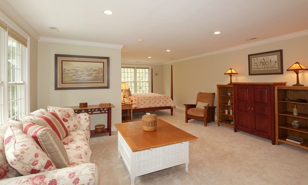 112 Newbridge Road Sudbury, MA 01776 - Photo 20 of 30 a living room with furniture and dresser