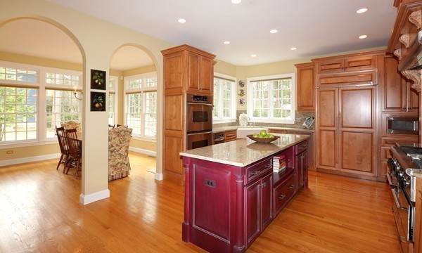 112 Newbridge Road Sudbury, MA 01776 - Photo 8 of 30 a kitchen with stainless steel appliances granite countertop a refrigerator a stove and a wooden floors