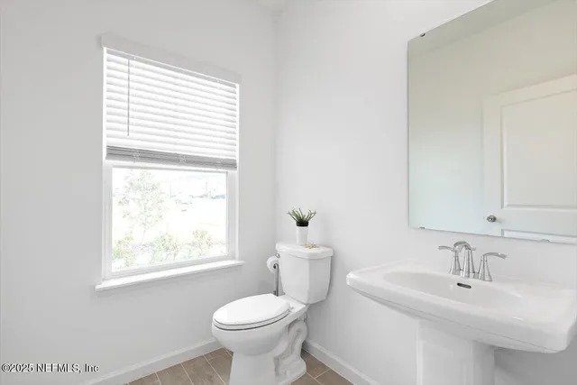 a bathroom with a sink and a toilet