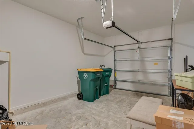 a view of a town with cars parked