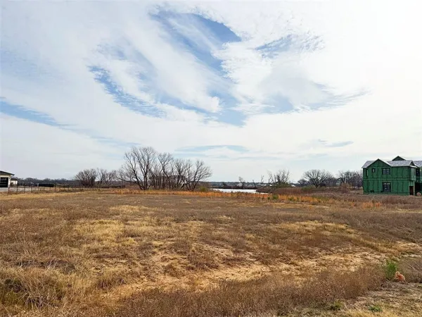 a view of a lake with outdoor space