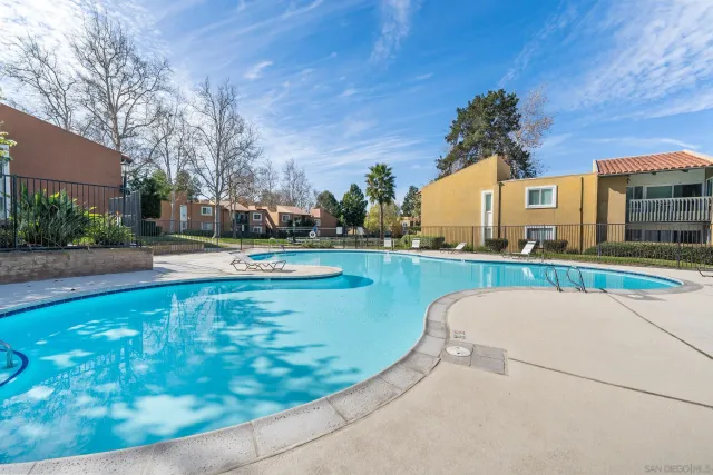 a view of a house with a swimming pool