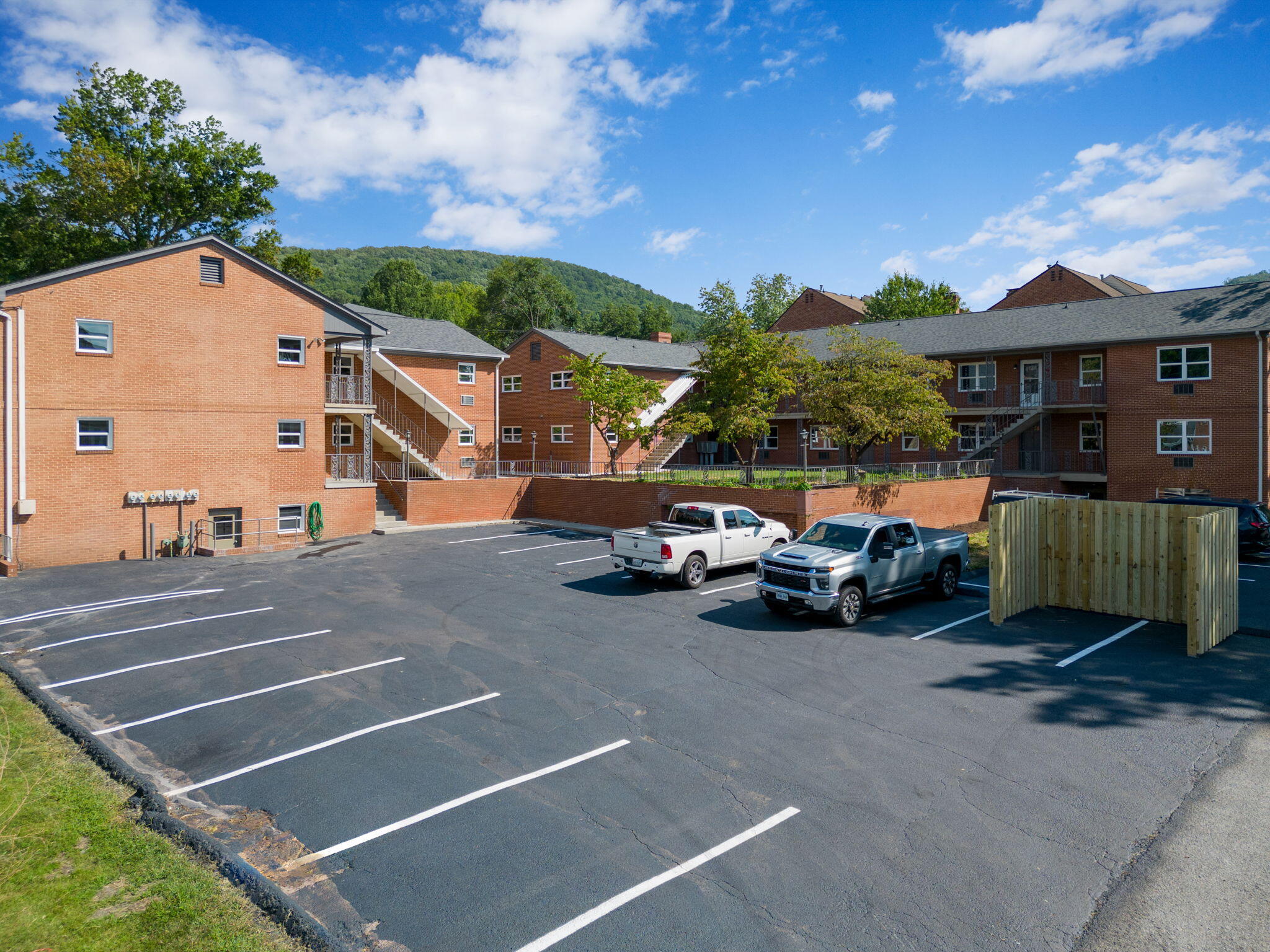 2209 Jefferson Street Southwest, Unit B Roanoke, VA 24014 - Photo 3 of 12 a view of a cars park in front of house