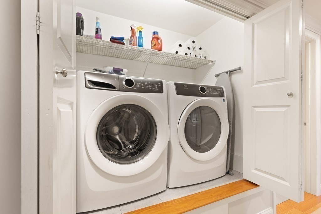 2 Manor Terrace, Unit 209 Lexington, MA 02420 - Photo 22 of 26 a utility room with dryer and washer