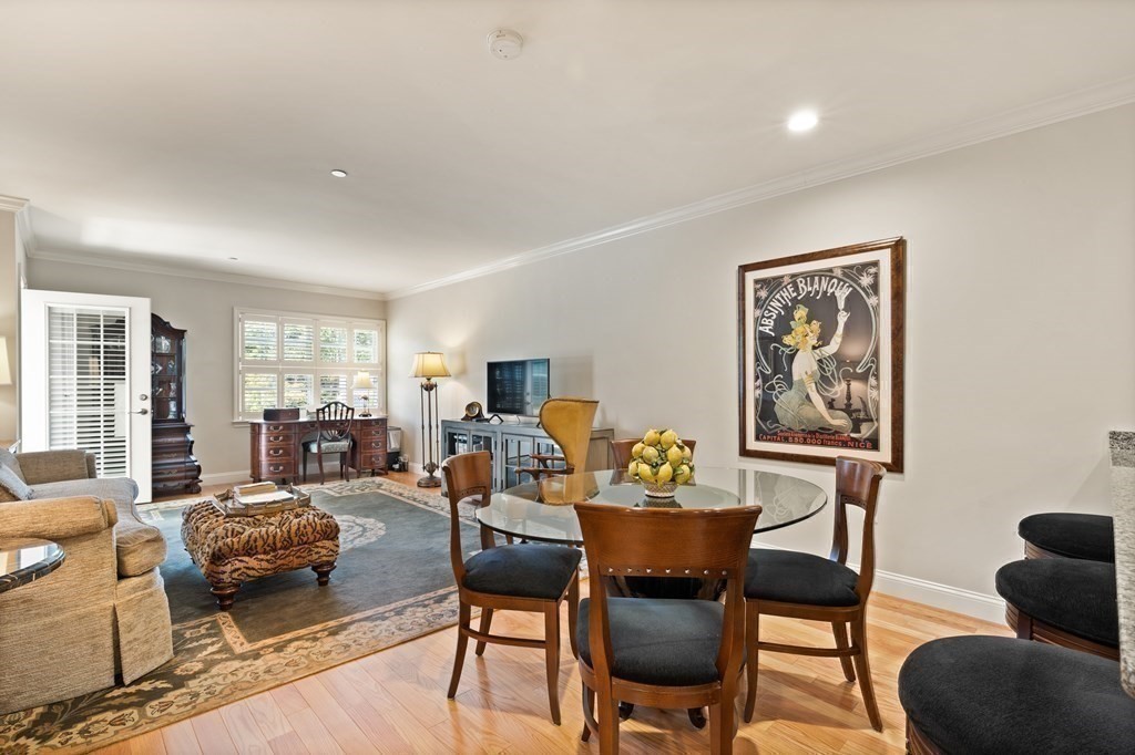 2 Manor Terrace, Unit 209 Lexington, MA 02420 - Photo 8 of 26 a living room with furniture and a large window