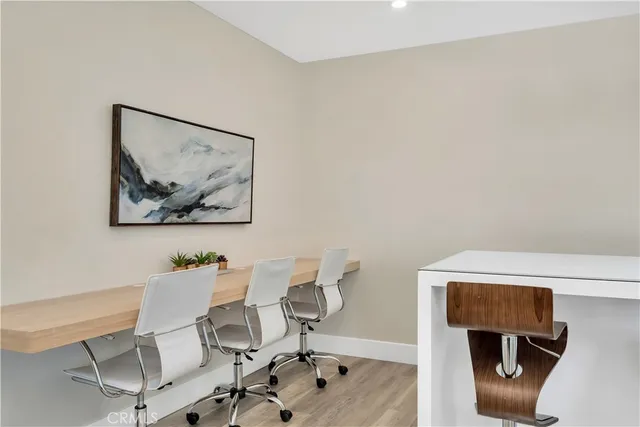 a view of a workspace with furniture