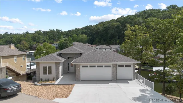 $865,000 | 80 Ledgestone Estates Court, Sunrise Beach, MO 65079